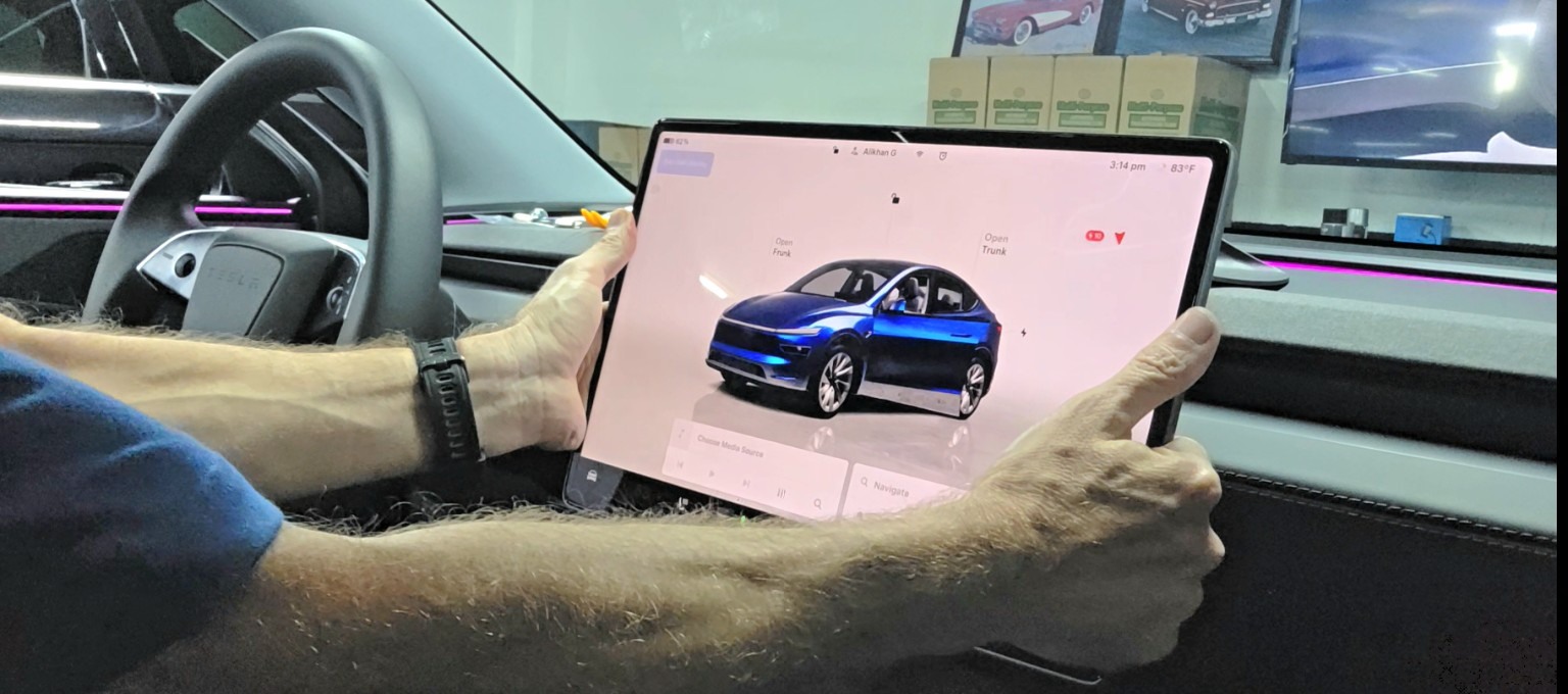 Tesla swivel screen mount installation at Honest Auto Works